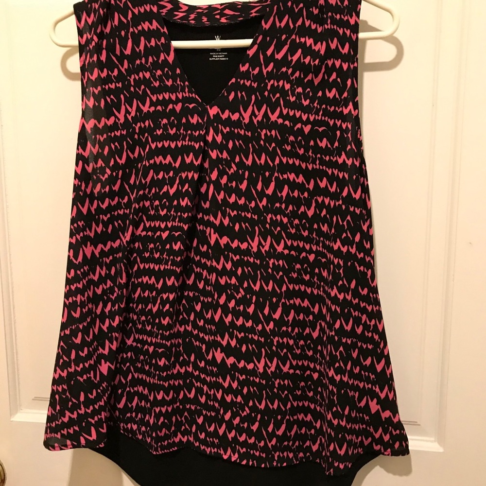 Pink and black sleeveless shirt